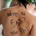 A swimmer wears his motivation on his back during the Washtenaw Interclub Swim Conference championships at Skyline High School on Thursday, July 25, 2013. Melanie Maxwell | AnnArbor.com